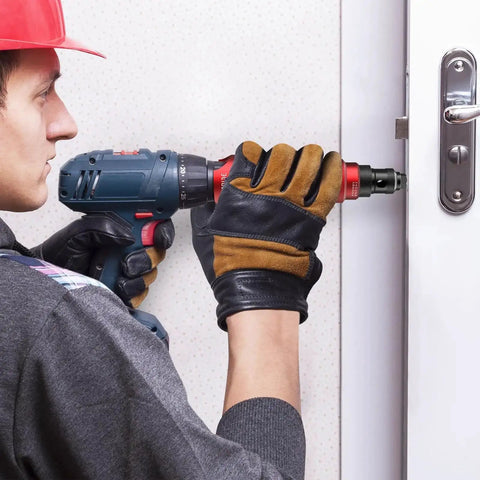 Person using Cordless Rivet Gun Adapter Kit For Drills Electric Rivet Drill Adapter on door metal frame