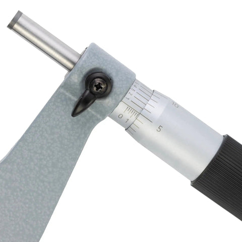 Close-up of a Conventional Micrometer 0-1 Inch With 0.0001 Vernier, Ratchet Thimble showing measurement scale and ratchet thimble.