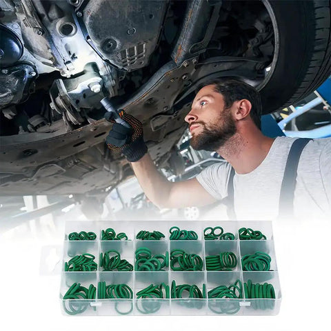 Mechanic using 270 Pcs O Ring Kit With 18 Size Assortment High Temperature Buna N Rubber Gaskets, includes organized green gaskets.