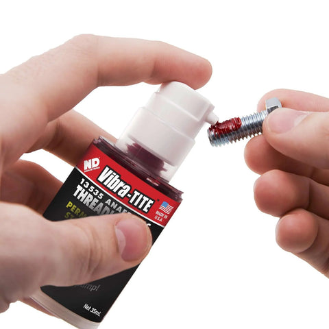 Hands applying Permanent Strength Gel Threadlocker Red For Fasteners Anaerobic Bonding Adhesive 35 Ml Pump to bolt thread