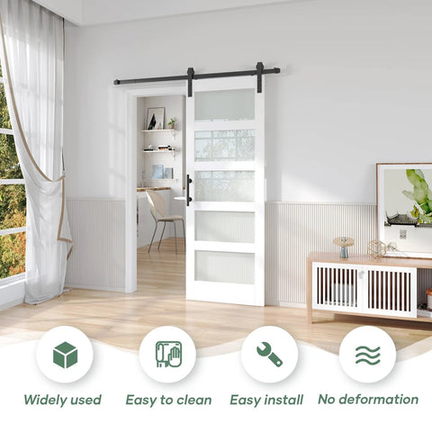 32 Inch By 84 Inch White Frosted Glass Sliding Barn Door With 66 Inch Hardware Kit And Handle installed in modern room