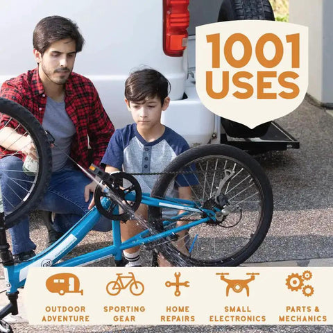 Man and boy fixing a blue bicycle using Multipurpose Plant Based Lubricant Spray Pack Of 3 All In One For Rust Removal And Lubricating Garage Doors Hinges And Locks, Eco Friendly Formula No Petroleum No PTFE 11 Oz Each Great For Tools And Equipment, 1001 uses listed.