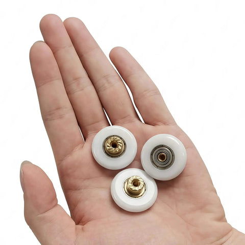 25Mm 304 Stainless Steel Shower Door Rollers with POM Bearings held in hand, durable for sliding doors, bathroom use