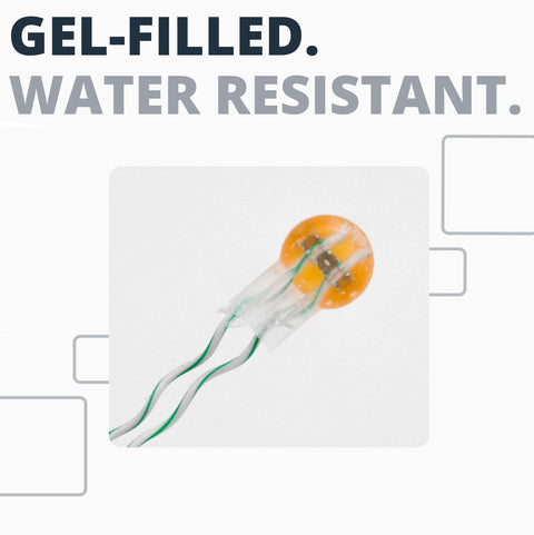 UY2 presslok gel-filled connector disk, orange with two green-striped leads, front view