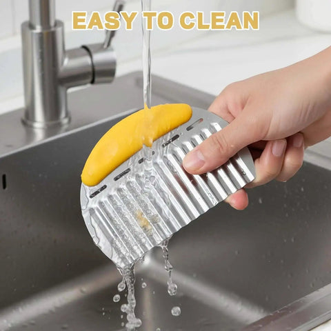 Person cleaning crinkle cutter from Two Pack Crinkle Cutter Set For Veggies And Waffle Fries, Sharp Stainless Steel Slicers, in sink