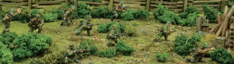 30 Piece Mid To Late War Waffen-SS Grenadiers Plastic Miniatures For Bolt Action WW2 Tabletop War Gamers Displayed in Terrain