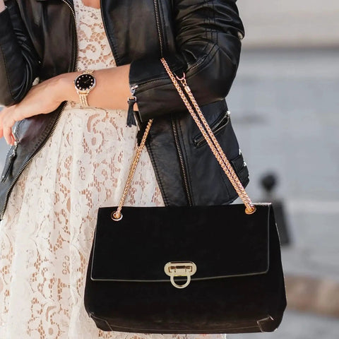 Woman holding a black handbag with gold turn lock from 4 Pack Turn Lock Clasp Ring Style Metal Clasp Locks Buckles Fasteners For DIY Handbag Making Purse Closures Twist Locks Gold Zinc Alloy Rustproof Hardware For Craft.