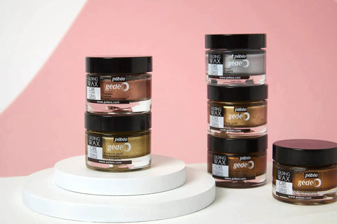 Gilding Wax Empire Gold Metallic Gilders Paste For Furniture Plaster Glass Paper And Metal With A Rich Sheen That Mimics Gold Leaf Easy Antiquing Wax For Craft Projects Safe For Multiple Surfaces Pebeo Five Point Six Ounce Jar displayed on a white surface with other color variations.