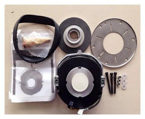 Front view of motor electromagnetic brake assembly kit: black housing, white friction plate, mounting disk, screws.