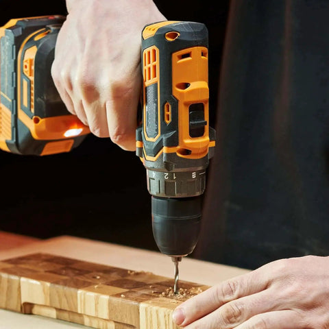 Person using Self Centering Hinge Tapper Core Drill Bit Set Pro Grade With One Quarter Inch Hex Shank on wooden surface