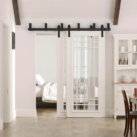 6Ft Double Track Bypass Sliding Barn Door Hardware Kit For Two Doors installed in a modern farmhouse interior, black steel.