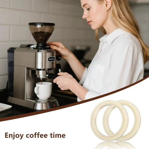 Two 54mm Silicone Steam Rings Replacement Gasket For 54mm Group Head Espresso Machines in packaging next to a woman using an espresso machine