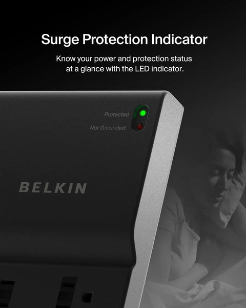 Close-up of Eight Outlet Surge Protector With Eight Foot Flat Plug 2500 Joules Of Protection UL Listed showing LED indicator.