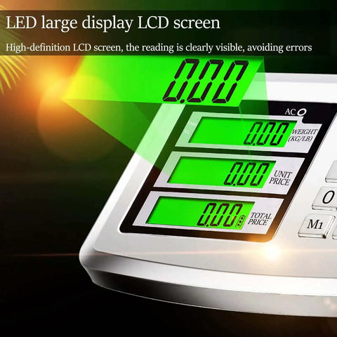Close-up of digital platform scale with LED display showing weight, unit price, and total price.