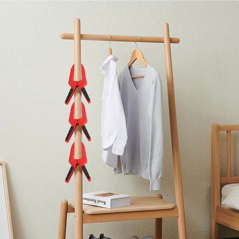 Grippy Woodworking Spring Clamp With Long Flat Nose For Precise Glue Ups And Fixture Work Plastic Handle Heavy Duty Metal Spring 3 Inch Opening Deep Jaw Reach 110mm Length 75mm Jaw Depth Red on clothing rack in living room
