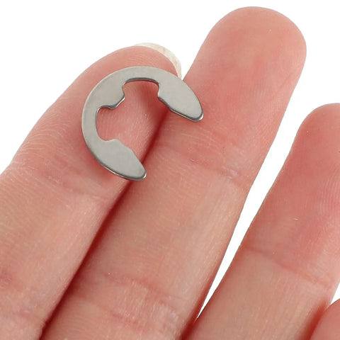 Close-up of E-type circlip from All In One Stainless Steel Hardware Kit Featuring 300 Pcs Open Split Washers And E Type Circlips 304 Stainless Retaining Ring Assortment