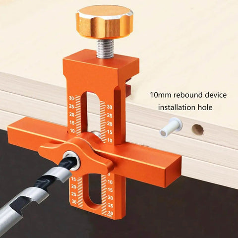 All Purpose Aluminum Cabinet Door Mounting Jig With Adjustable Positioner in bright orange mounted on wood edge
