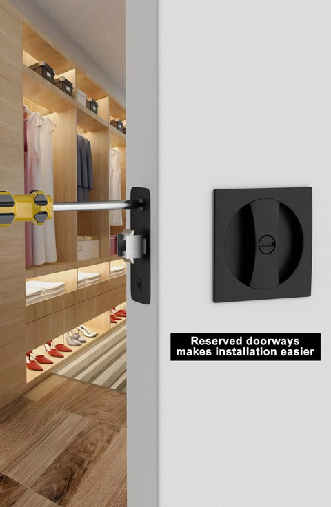 Matte Black Pocket Door Lock Set In Zinc Alloy, 2-3/8 Backset, shown installed with a screwdriver in a modern closet door