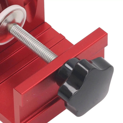 Close-up of the Aluminum Alloy Hole Jig System for Woodworking DIY Projects with 3 Step Drill Bits and adjustable clamp mechanism.