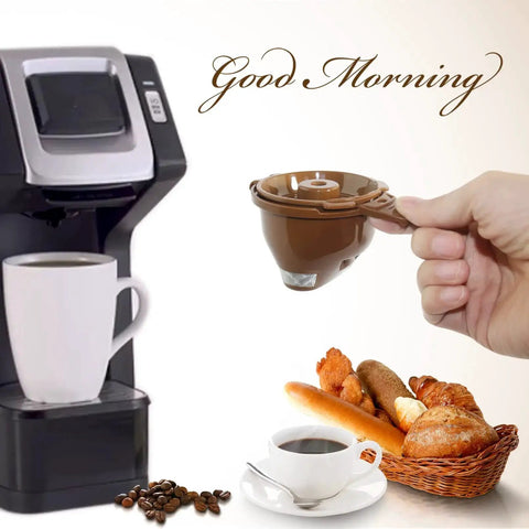 Brown single-serve coffee brew basket held in hand; coffee maker in background.