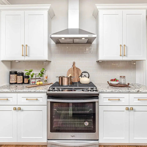 Kitchen cabinets with 10 Pack 5 Inch Cabinet Handles In Champagne Bronze For Kitchen And Dresser Drawers installed above a stove.