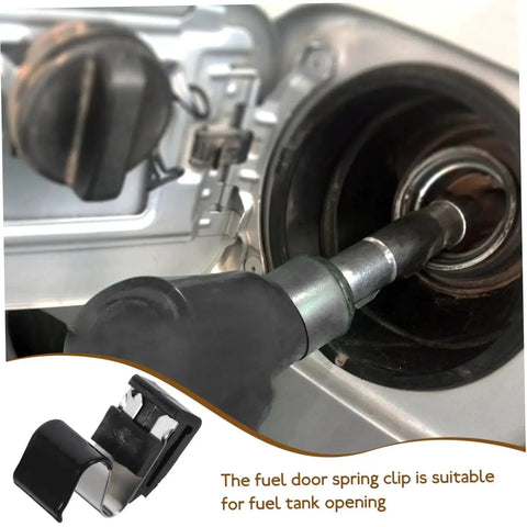 Gas tank door spring clip replacement, front view, black plastic clip for fuel door seal and secure closure