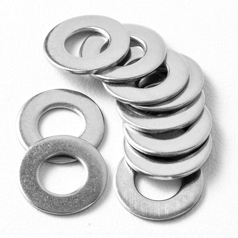 Stainless steel flat washers, 9/16 in outer diameter and 3/16 in inner hole, silver metal, stacked on white surface