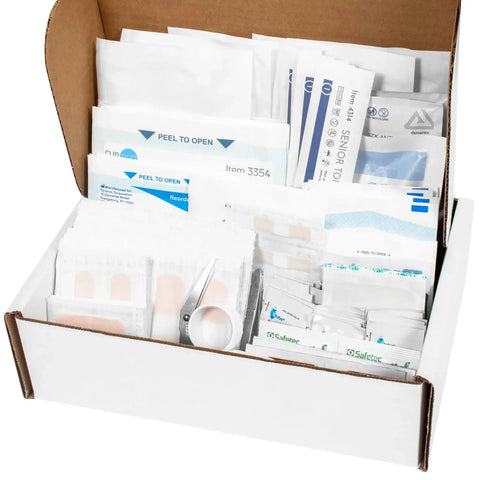 Open box of Complete First Aid Kit Refill Pack With Over 180 Essential Items For Small To Medium Boxes Including Bandages Gauze Antiseptics And More