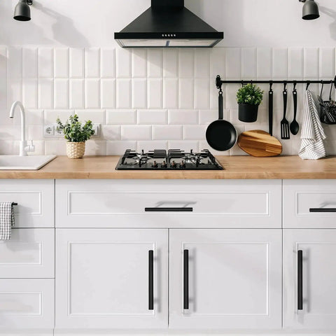 Modern kitchen with white cabinets featuring Twenty Pack Matte Black Cabinet Pulls With 96 Millimeter Hole Center For Easy Install And A 5.7 Inch Overall Length Stainless Steel Hardware For Kitchen Cabinets Bathroom Drawers And Closet Shelves.