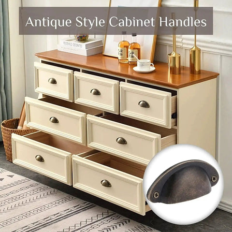 Antique Bronze Shell Cup Pulls Set Of 10 For Cabinets And Dressers with screws, vintage style zinc alloy hardware on white drawers.