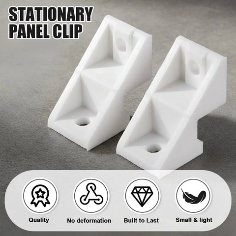 Eight Pack Patio Door Clips And Fixed Panel Brackets For Wood Gliding Sliding Doors Durable Plastic Construction Abrasion Resistant Brackets For Stable Long Lasting Operation In Bulk Pack, showing two white plastic stationary panel clips with mounting holes on a gray surface.