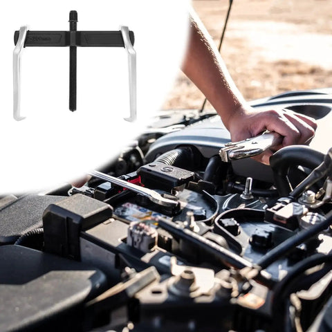 Two Jaw Gear Puller 8 Inch Heavy Duty Claw Puller For Pulleys Flywheels Bearings And Hubs in use for automotive repair.