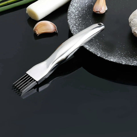 Six Blade Scallion Cutter Shred Knife With Stainless Steel Blades For Even Onion And Garlic Shredding, Must Have Time Saver Veggie Chopper For Home Kitchen And Professional Use In Restaurants Or Hotels, Compact Silver A122 By UGpine on dark surface with garlic and scallions