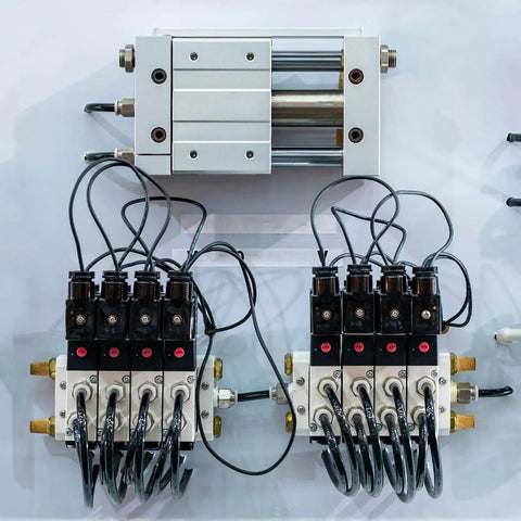 Pneumatic system setup with valves and connections, featuring Long Brass Pneumatic Exhaust Muffler Silence for Solenoid Valves One Eighth Inch NPT.