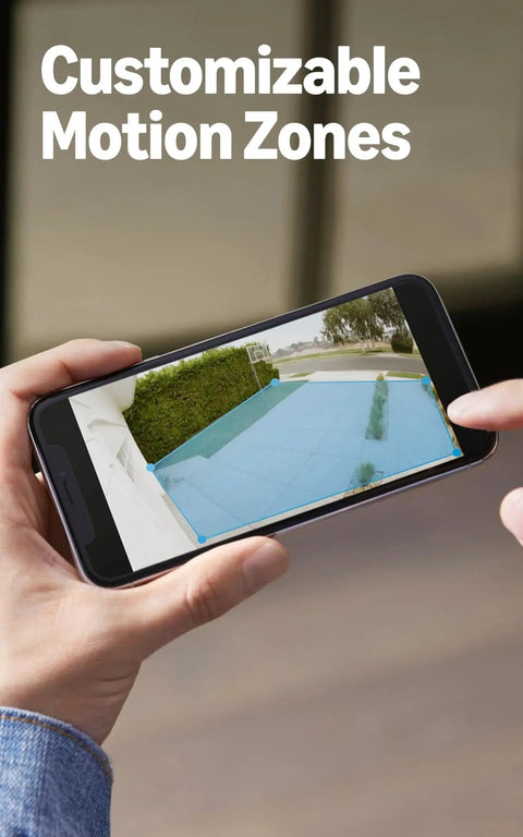 Person using phone to adjust Spotlight Cam Plus Battery Security Camera With HD Video Color Night Vision motion zones
