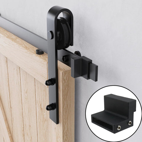 Black Carbon Steel Sliding Barn Door Roller Stopper Hardware Set With Wrench, shown installed on a wooden door track.