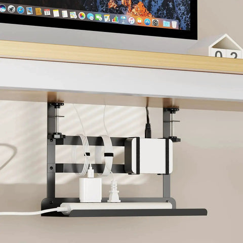 Under Desk Cable Management Tray With No Drill Clamp Mount installed under a desk holding cables and power strips, ideal for home office use.