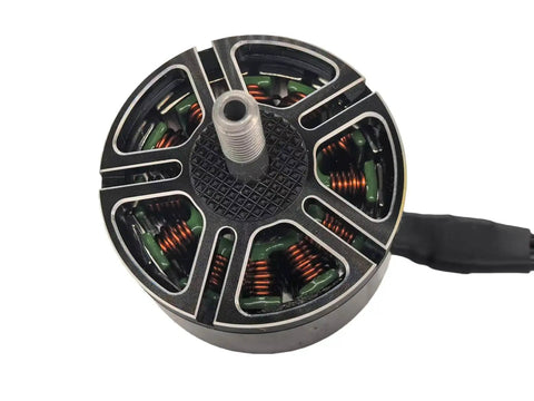 Close-up of 900Kv Brushless Drone Motor for Multirotors with 3 to 6S battery, 9 to 11 inch propeller, outer rotor design.