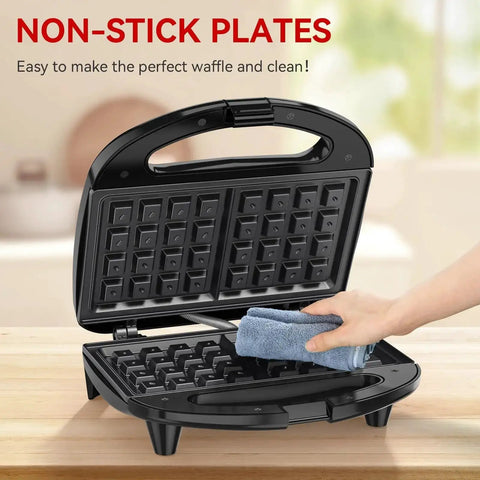 Open 2-Slice Nonstick Waffle Maker With Indicator Lights, Fast 750W Heating, showing nonstick plates being cleaned with a cloth.