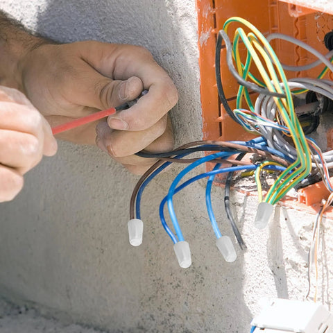 40pcs high-temperature ceramic wire connectors; white porcelain caps on blue and brown wires during electrical installation