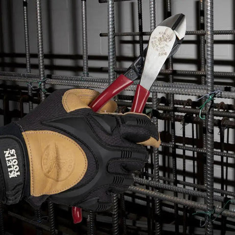 Diagonal Cutting Pliers D248 9ST Workhorse High Leverage Rebar Cutter And Rebar Bender Angled Head For Confined Spaces Short Jaws And Beveled Cutting Edges Hooked Handle So It Will Not Slip Made In USA Ironworker Tool in hand cutting wire.