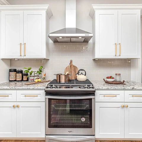 Kitchen with white cabinets featuring Champagne Bronze Cabinet Pulls 5 Inch Zinc Alloy, installed on drawers and cabinet doors.