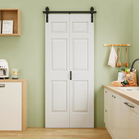 32x84 Inch Bi Fold Barn Door Set With Six Raised Panels, Paintable White Primed Finish, installed in a kitchen