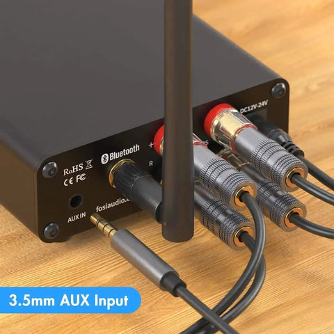 Rear view of BT10A Bluetooth 5.0 Stereo Amplifier Receiver 2 Channel Class D Mini Hi Fi Integrated Amp with connected audio cables