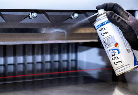 Grease-Free Dry PTFE Lubricant Spray For Metal, Plastic And Wood Surfaces, No-Mess Non-Stick Coating in use on machinery