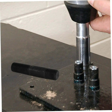 Using Hydraulic Heavy Duty Workhorse Knockout Punch Driver Kit For Metal Sheets And Electrical Conduit on metal surface