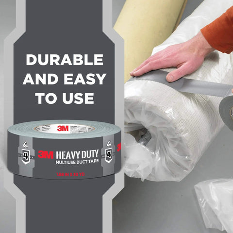 Person using Heavy Duty Duct Tape 1.88 in x 45 yd (2 Rolls) to seal a rolled carpet, showcasing its multi-surface adhesive.