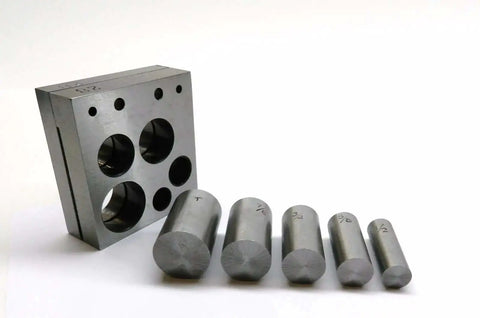 Six Piece Disc Cutter Set With High Carbon Steel Punches and Cutter Block for cutting precise discs from sheet metal