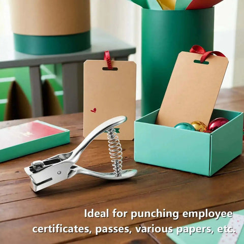 Heavy Duty All Metal Badge Hole Punch for ID Cards with 15x3mm slots, placed on a table next to boxes and tags, ideal for PVC badges.
