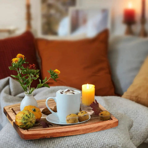 Acacia Wood Cutting Boards Set 10 Pcs Bulk for Laser Engraving and Charcuterie Serving Grooved Chopping Boards for Cheese Bread Fruit 8x10 Inches Party Ready Gift Worthy Holiday Housewarming on couch with candle, plant, muffins, and cozy decor.